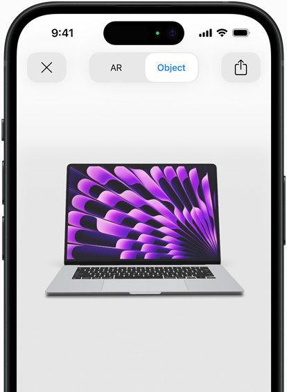 Pratinjau MacBook Air dalam warna Abu-abu yang ditampilkan dengan AR di iPhone